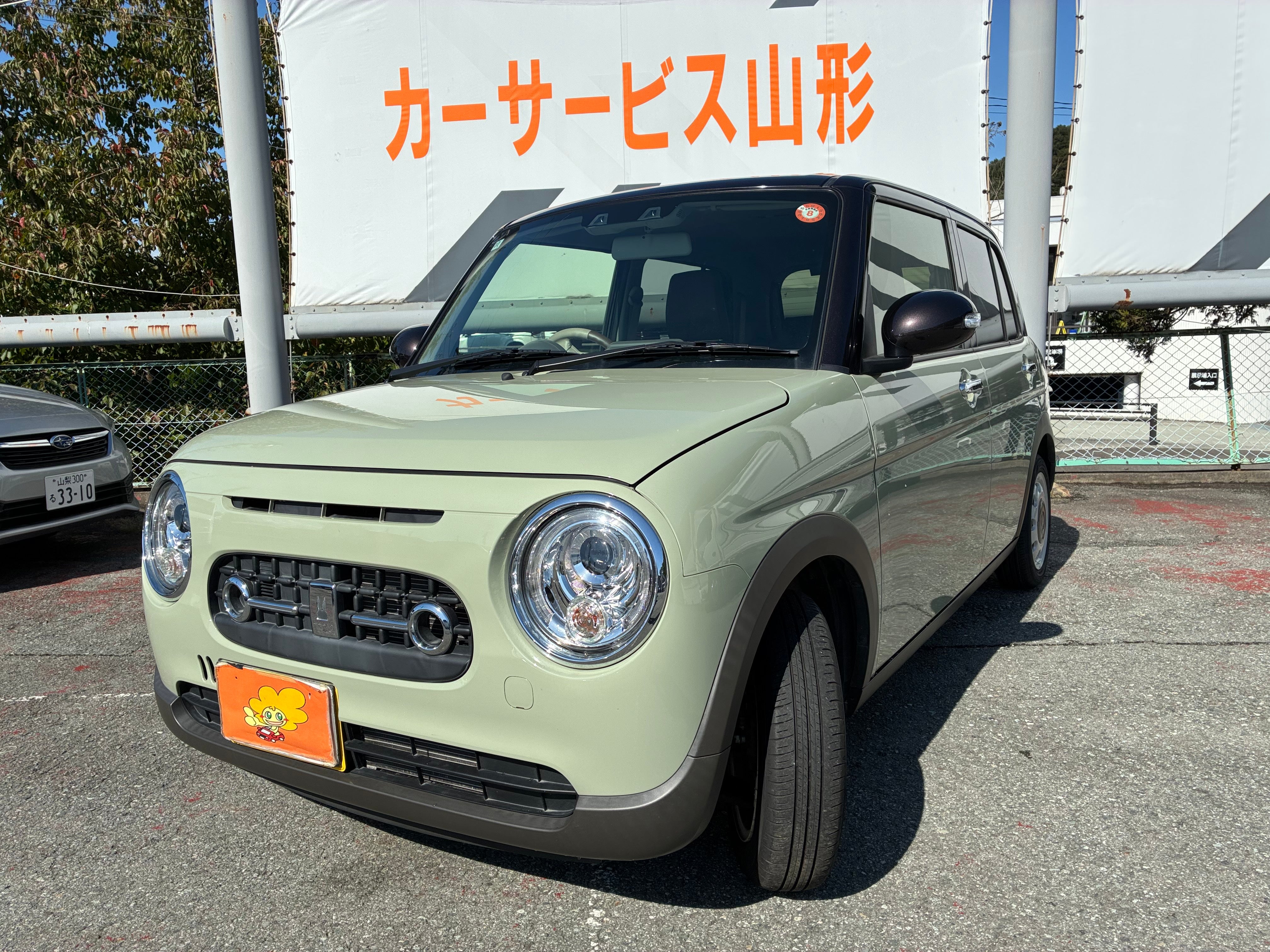令和9年10月中旬まで可能】ラパンLC /グリーン×茶ツートン HE33S